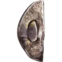 1/2 Dollar Countermark on 1/3-cut Spanish or Spanish Colonial 8 Reales, with plug